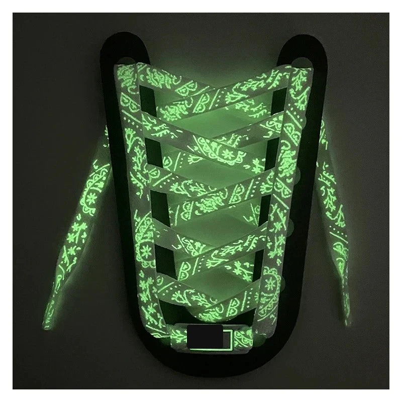 Glow in the dark shoelaces glowing green in the dark