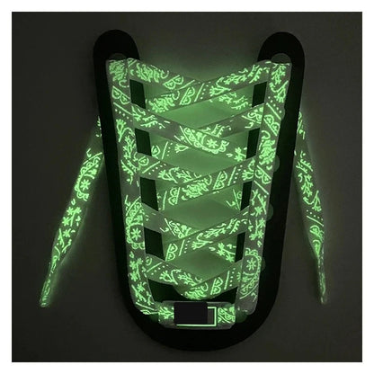 Glow in the dark shoelaces glowing green in the dark
