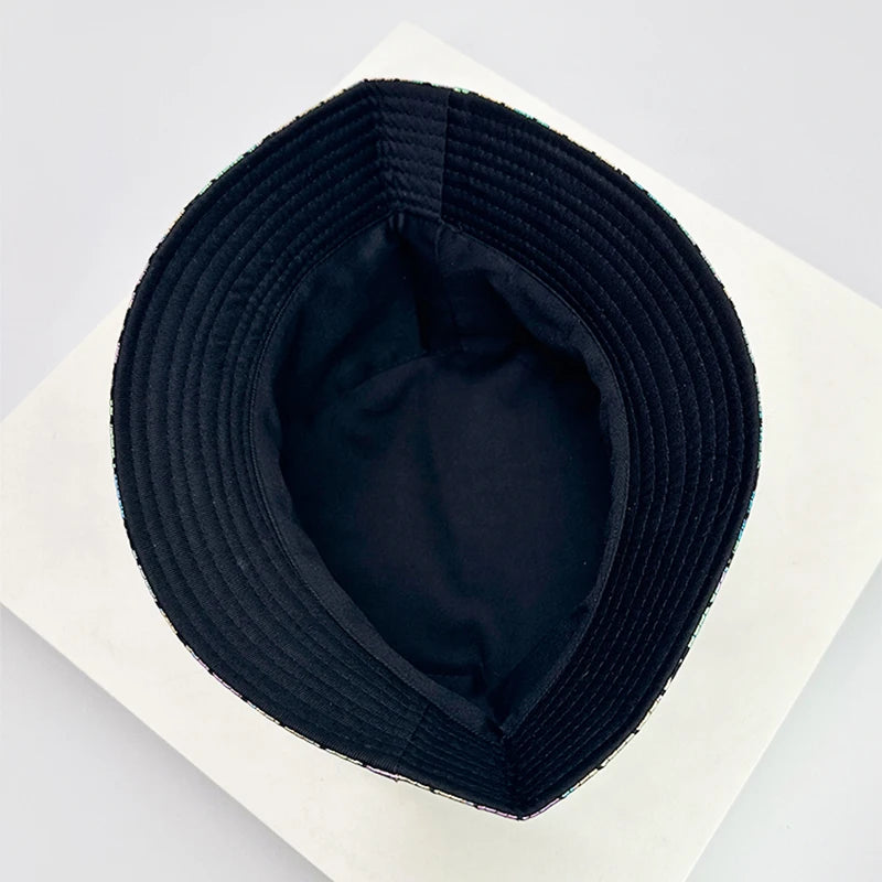 Soft black lining inside the metallic bucket hat